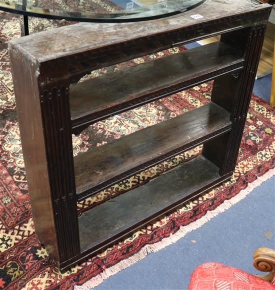 An early 18th century oak three tier wall shelf